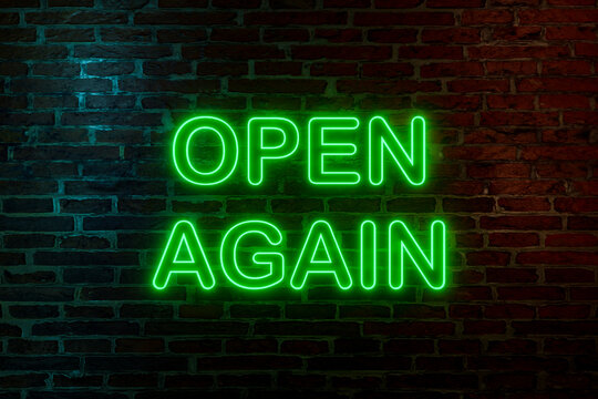 Open again, neon sign. Brick wall at night with the text 