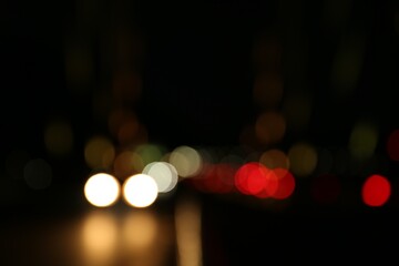 Wall Mural - Blurred view of city lights at night. Bokeh effect