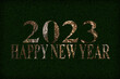 2023 happy new year sobre fondo negro con texto dorado con textura de piedra dorada