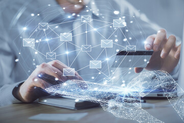 Poster - Double exposure of man hands holding a credit card and envelop fly drawing. E-mail and E-commerce pay on-line concept.