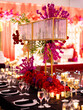 Beautiful wedding set with floral compositions and cutlery in a restaurant, prepared for Indian wedding celebration