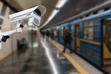 Wall Mural - CCTV Camera security operating on subway station platform.underground railways station