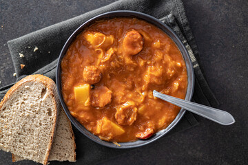 Wall Mural - The cabbage soup in plate. Healthy vegetable soup. Top view.