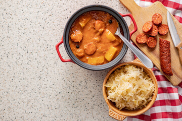 Wall Mural - The cabbage soup in pot. Healthy vegetable soup. Top view.