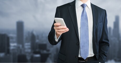 Poster - Young business person holding phone in city