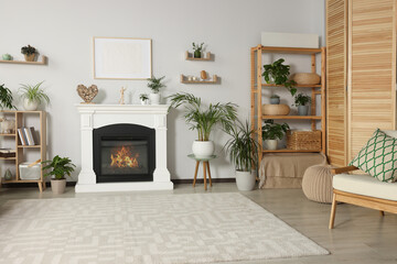 Sticker - Stylish living room interior with fireplace and houseplants