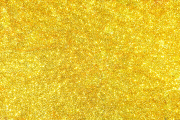 Poster - Abstract golden texture in blurry light for background. Glitter pattern for photo effect and wallpaper