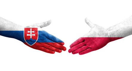 Wall Mural - Handshake between Poland and Slovakia flags painted on hands, isolated transparent image.