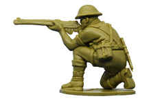 Plastic Soldier From WWII With Rifle Who Kneels And Shoots. Boys Toy From The 70s And 80s