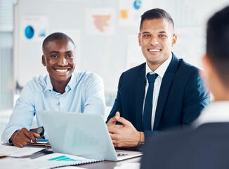 Meeting, laptop and finance with a business man and team in discussion together in an office boardroom. Computer, accounting and teamwork with a male employee group working with documents on a table