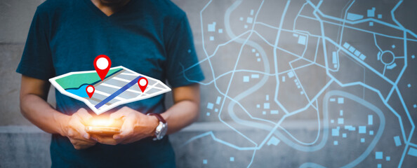 Aufkleber - businessman hand holding virtual world and model map with location point , gps app, icon travel maps