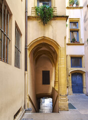 Wall Mural - Traboule and court in Lyon old district of Saint Jean, picturesque historic passageways between streets