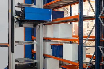Poster - Machine for distribution goods on racks. Robotization warehouse processes. Placement goods in warehouse. Storage shelves inside factory. Fulfillment automation machine. Storage innovative manufactory