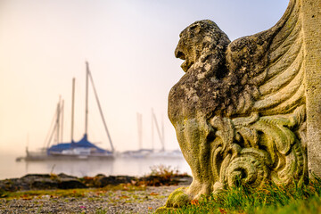 Wall Mural - historic lion statue at the lake starnberg