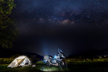 Wall Mural - milky way galaxy at night. image contains noise and grain due to high iso. image also contains soft 