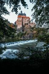 Poster - Beautiful view of the Kriebstein Castle through tree branches