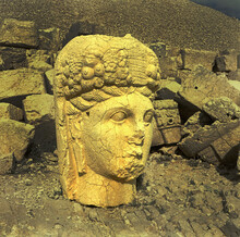 Heads Of The Statues On Mount Nemrut Dagi In Turkey. The Mausoleum Of Antiochus I (69–34 B.C.) - UNESCO World Heritage Site