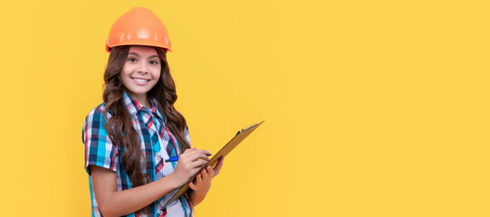 Sticker - signing a contract. on construction site. future engineer hold clipboard. safety work expertise. Child builder in helmet horizontal poster design. Banner header, copy space.