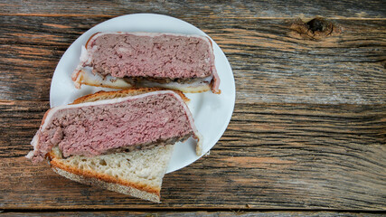 Wall Mural - Home made pate wrapped in bacon  from pork and liver on  table