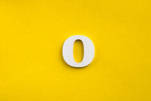 Letter O Uppercase - White Wood Letter On Yellow Color Background