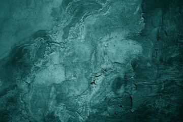 Wall Mural - old green concrete wall surface. сrumbled. close-up. dark teal rough background for design.