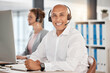 © M Einero/peopleimages.com - Portrait, call center and customer service employee in office at desk with smile. Consultant, contact us or male sales agent, telemarketing or crm, help desk or support worker consulting in workplace