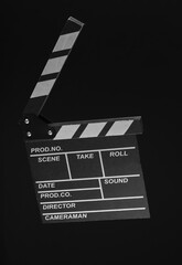 Sticker - Movie clapperboard isolated on black background