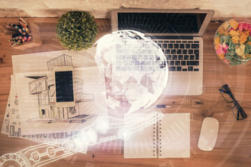 Poster - Double exposure of map hologram drawing over study table background with computer. Concept of international network. Top view.