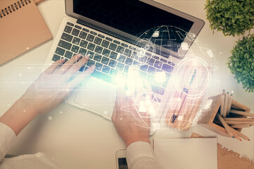 Poster - Double exposure of woman hands working on computer and social network theme hologram drawing. Top View. People connection concept.