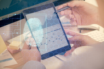Aufkleber - Double exposure of man's hands holding and using a digital device and fingerprint hologram drawing. Security concept.