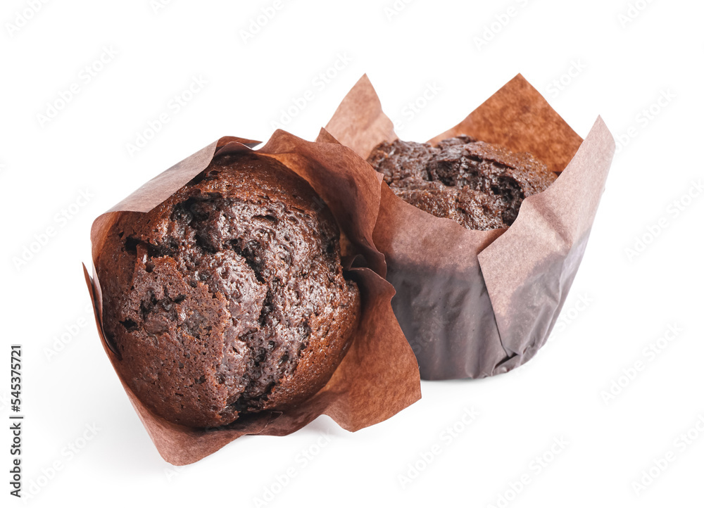 Tasty chocolate muffins isolated on white background