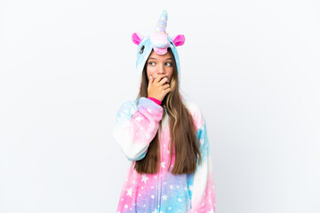 Poster - Little caucasian girl wearing unicorn pajama isolated on white background having doubts and with confuse face expression