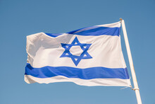 Flag Of Israel On Blue Sky Background