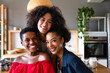 © oneinchpunch - Three mixed race hispanic and black women bonding at home - Multiracial group of happy young female adults spending time together and having fun