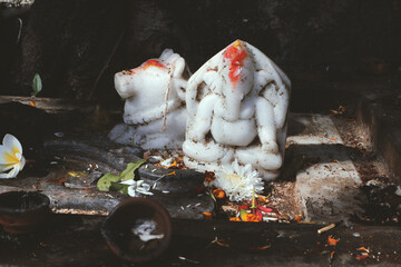 Sticker - Ganesha deity and Nandi goby on Shiva altar under banyan tree in Rishikesh, Uttarakhand, India.