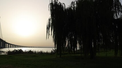 Sticker - Sunrise next to Vasco da Gama Bridge on the Tagus River