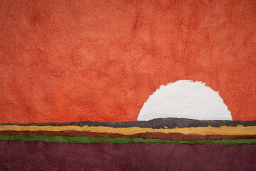 moon or sun rising over abstract colorful landscape, blank circular watercolor paper