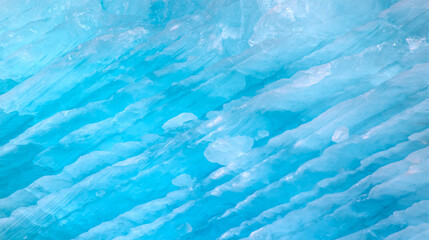 Wall Mural - a close-up of the layered surface of a blue glacier - knud rasmussen glacier near kulusuk - greenlan