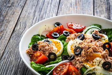 Sticker - Nicoise salad - tuna, hard boiled eggs, greens, tomatoes and black olives