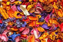 A Closeup Of Colorful Dried Flowers, Fragrant Herbs, And Plant Seedpods Used As Flower Potpourri
