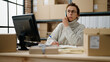 © Krakenimages.com - Middle age hispanic woman ecommerce business worker talking on the smartphone at storehouse office