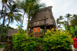 Laie, Hawaii - February 21, 2022 : Palm thatch-roofed open hall as part of the Polynesian Cultural Center on the North Shore of O'ahu island in Hawaii, United States
