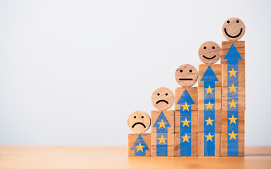 Poster - Emotion face since very smile regular and sad on increasing wooden stacking with up arrow and star level for client evaluation after customer use product and service concept.