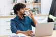 © kucherav - Young man freelancer or entrepreneur working at home office, taking a break, drinking refreshing water. Healthy lifestyle, recuperation concept