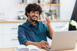 © kucherav - Portrait of happy Asian entrepreneur or freelancer, working in the home office holding glass of water and looking at the camera and smiling. Healthy lifestyle, recuperation concept