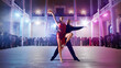 © Artur Didyk - Couple dancers perform latin dance on large professional stage. Ballroom dancing.