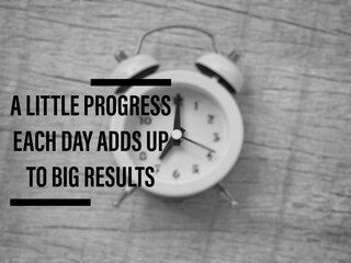 Wall Mural - Motivational and inspirational quote - A little progress each day adds up to big results. With vintage styled background.