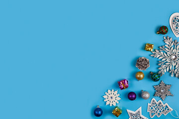 Wall Mural - Christmas decorations, snowflakes on blue background.