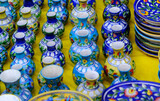 Fototapeta Paryż - Hand made colorful ceramic pottery. Hand painted pottery. Traditional pottery fair in Pune, India.