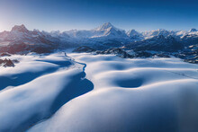 Snow Covered Mountain Aerial View From Drone Showing Spectacular Alpine Landscape Of Winter Mountain In Switzerland